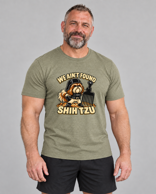 Ed wearing We Ain't Found Shih Tzu 2.0 Everyday T in Heather Olive