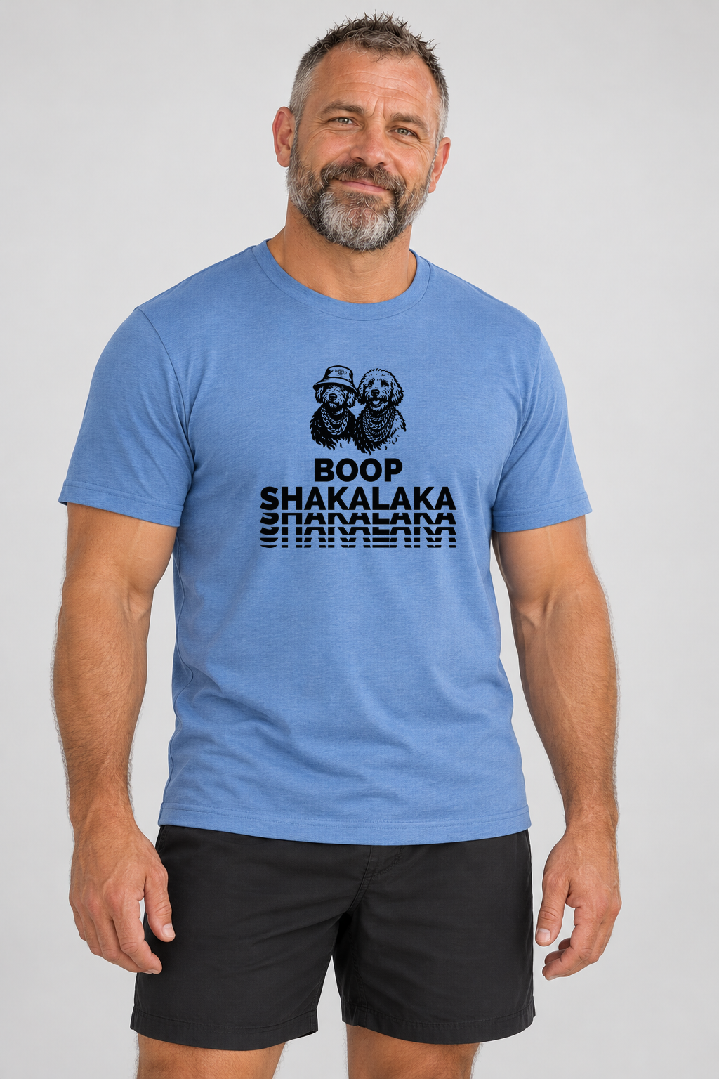 Ed wearing Boop Shakalaka Everyday T in Heather Columbia Blue, studio front view