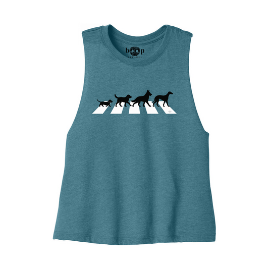 Boop Apparel All You Need Is Dogs crop tank in Heather Deep Teal, front flatlay with four dogs crossing white stripes and original Boop inside-neck label.