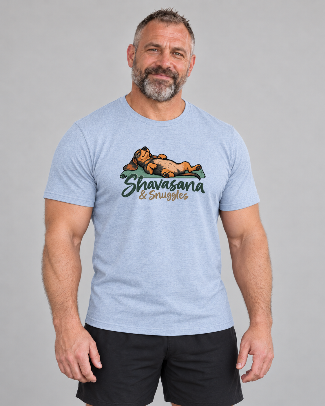 Ed wearing Shavasana and Snuggles Everyday T in Heather Blue