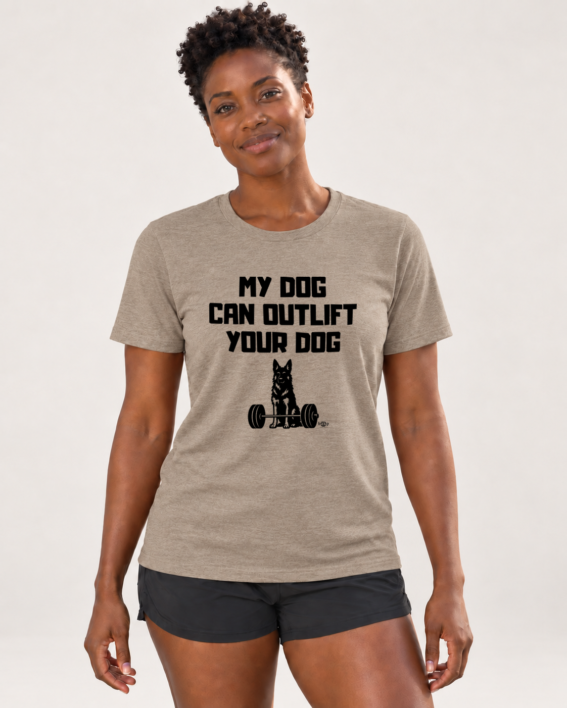 Brandy wearing the Outlift Everyday T in Heather Tan