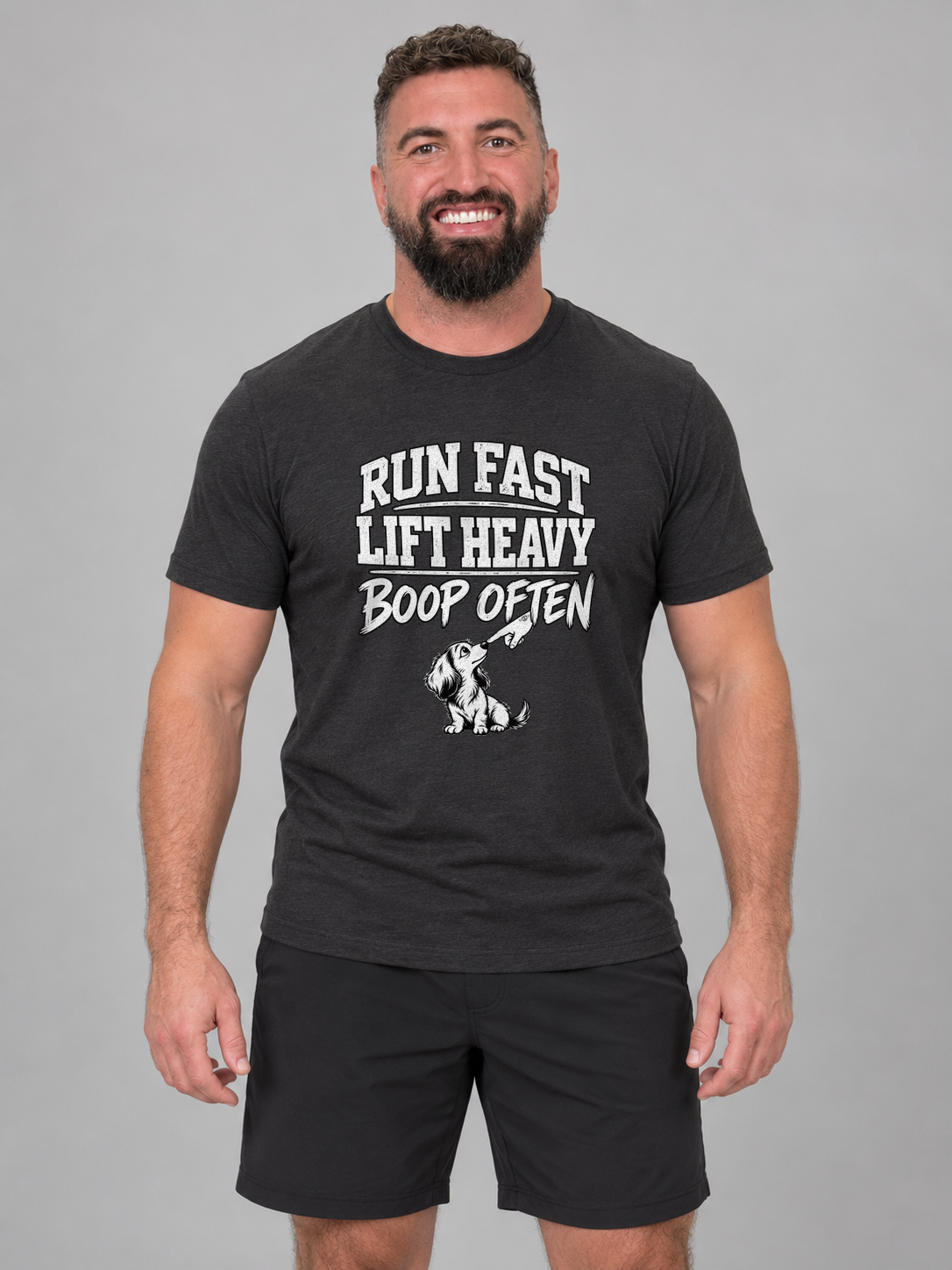 Dan wearing Run Fast. Lift Heavy. Boop Often. Everyday T in Black Heather, front studio view
