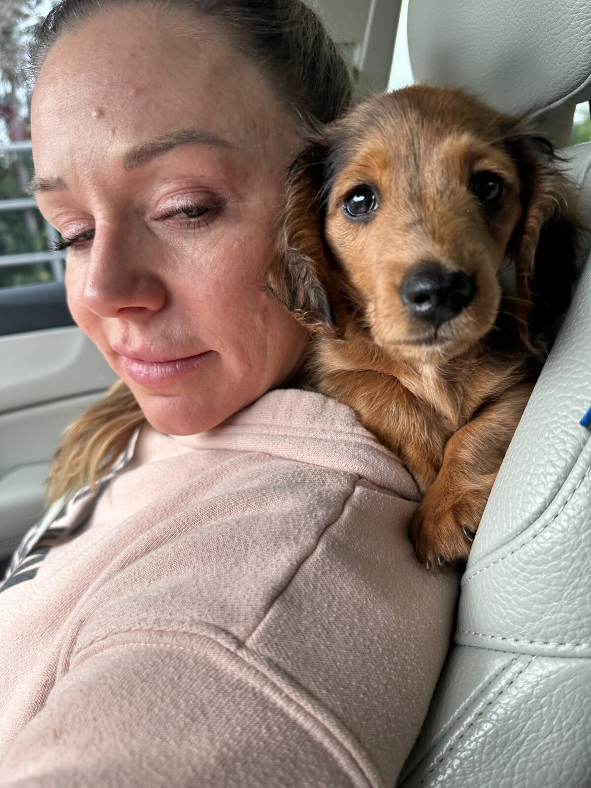 Meg with Chuck Norris as a puppy